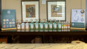 A variety of prize-winning spirits from Linden Leaf distillery in Cambridge, sitting on a bar.